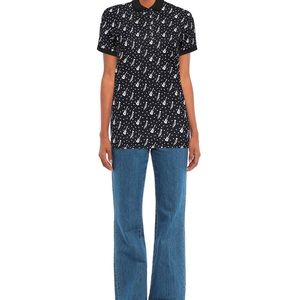 Dolce & Gabbana polo shirt, guitar trumpet design, size 10, medium